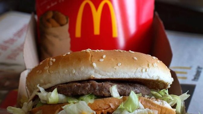 Woman sues McDonald's after complaining that a cheeseburger advert was so irresistible it caused her to break her fast during Lent. WILL SHE WIN?