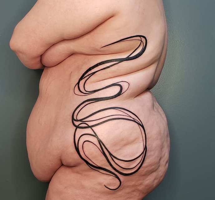Once Your Back Fills Out, Will You Get Roll Flowers Tattooed on Your Folds?