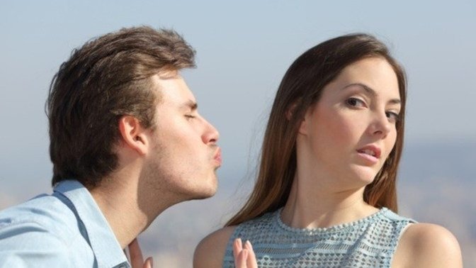 What is the best way to handle the awkward situation of kissing someone?