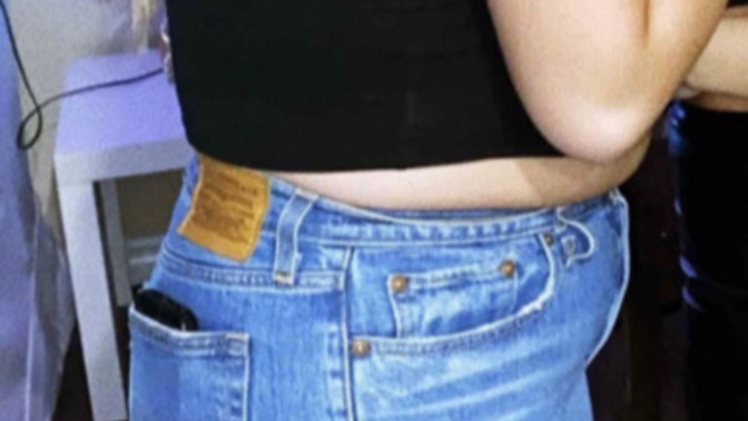 What is up with these girls wearing shorts that squeeze their bellies?