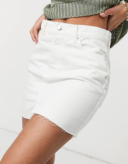 Which skirt would go with this sweater better?