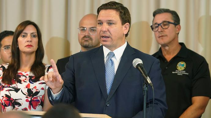 Florida Governor Ron DeSantis is vaccinated but he rarely encourages his people to get vaccinated and he NEVER encourages masks.