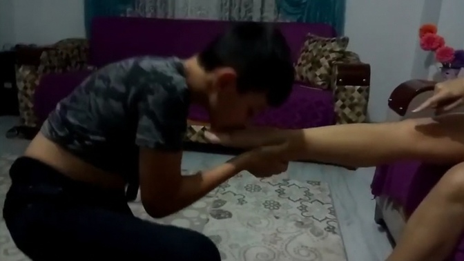 Kissing her foot to apologize?