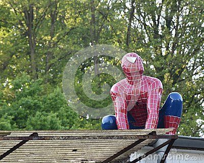 How would you react if you walked outside and caught spiderman hiding and snapping pictures ontop of your roof?