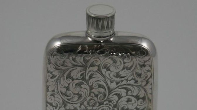 Is an antique flask bad taste for a birthday gift?