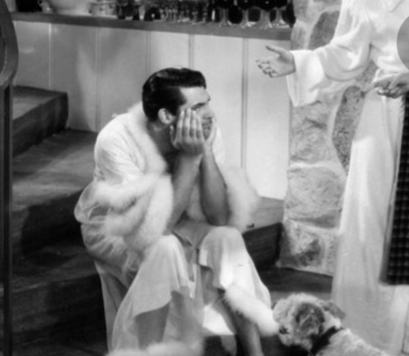 Cary Grant wearing womens clothing for a comedy movie