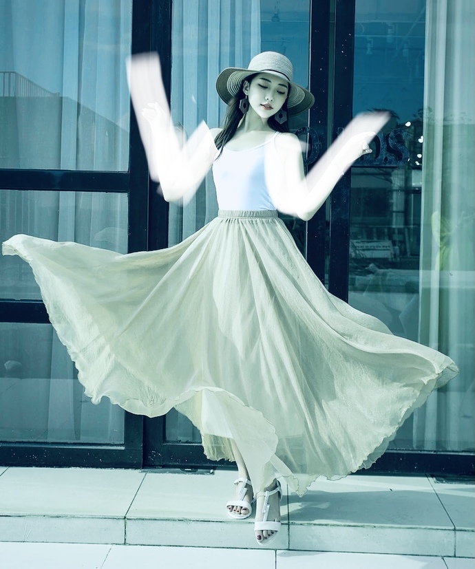 She has a shirt shirt on but you csn wear long sleeve top 😊 floor length chiffon skirt
