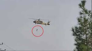 This is what Taliban is using helicopters for , hanging people that were on Bidens list that helped US, can you believe this?