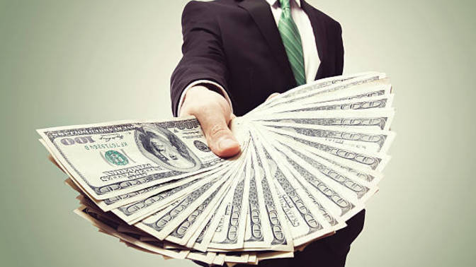 Can money compensate for lack of looks?