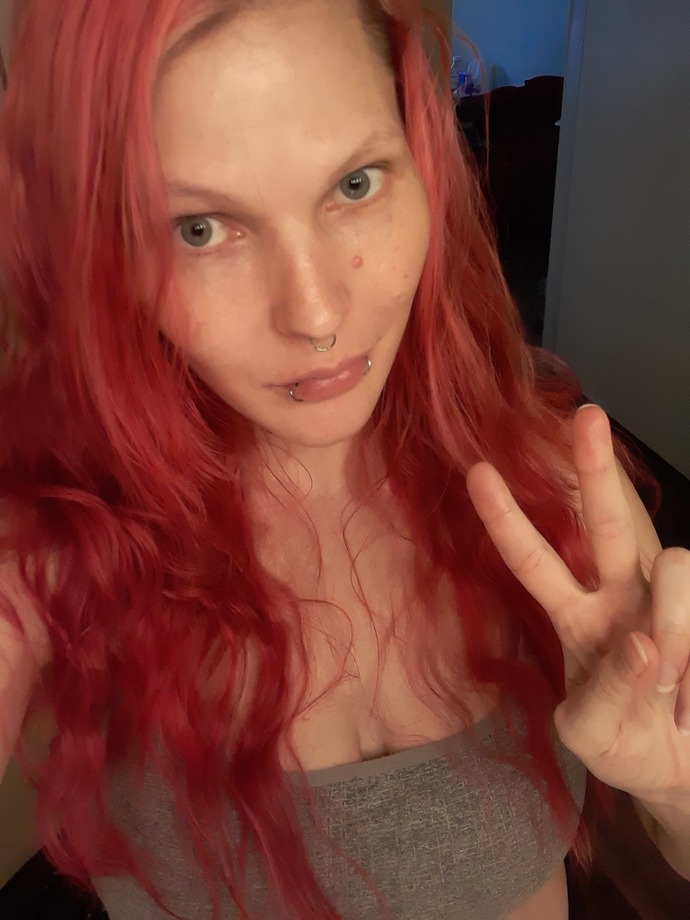 Why dont guys like girls with colored hair and piercings?