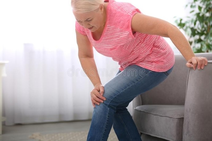 Should I inform my employer of an employee I work behind that cannot perform her duties? I honestly feel its time for her to retire. Report or not?