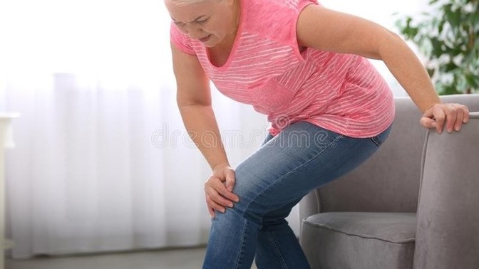 Should I inform my employer of an employee I work behind that cannot perform her duties? I honestly feel it's time for her to retire. Report or not?