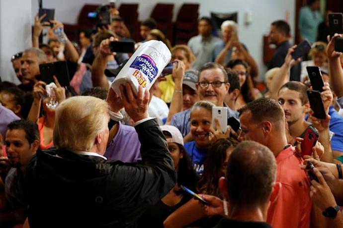 Which was more of a PRESIDENTIAL WAY to handle a Hurricane Event?