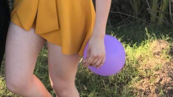 Does it looks like she brought a size smaller than she needed to OR does it looks like this dress was intentionally made to be tiny?