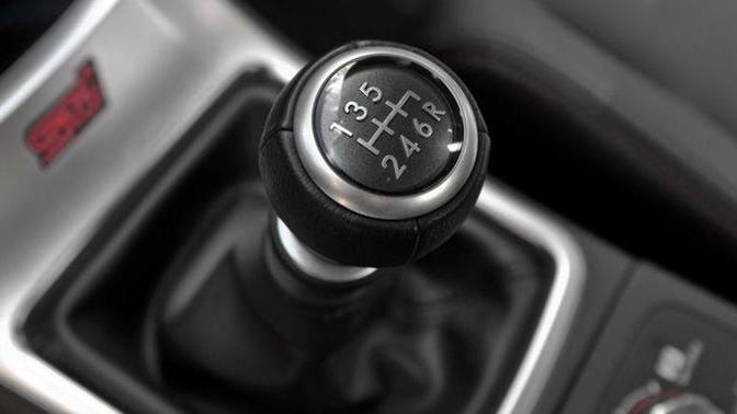 Who loves driving manual transmission cars and trucks?