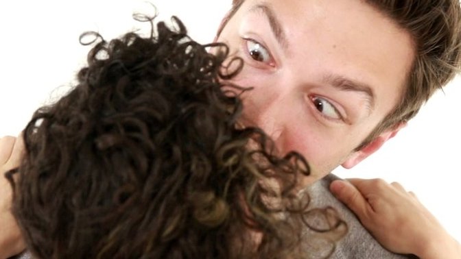 Why would you or do you look at a woman while kissing?