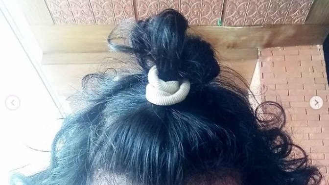 What do you think of curly hair tied like this?