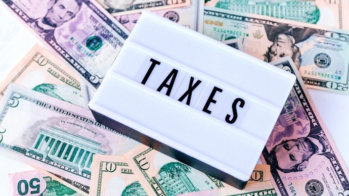 Wtf is my employer over taxing me? Should I go to a tax preparer to be sure?