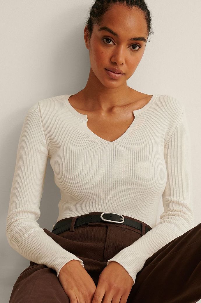 Should I get a top or a sweater?