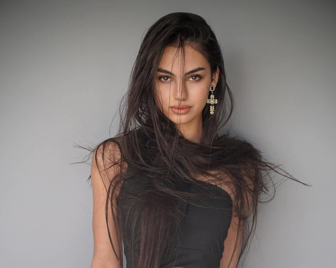 EVEN THOUGH SHE IS GORGEOUS DO YOU FIND HER BEAUTY TO BE UNIQUE AND RARE?