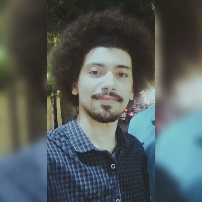 The guy in the back is actually a person not a mannequin lol