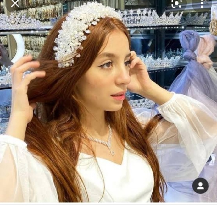 Would you guess her ethnicity?