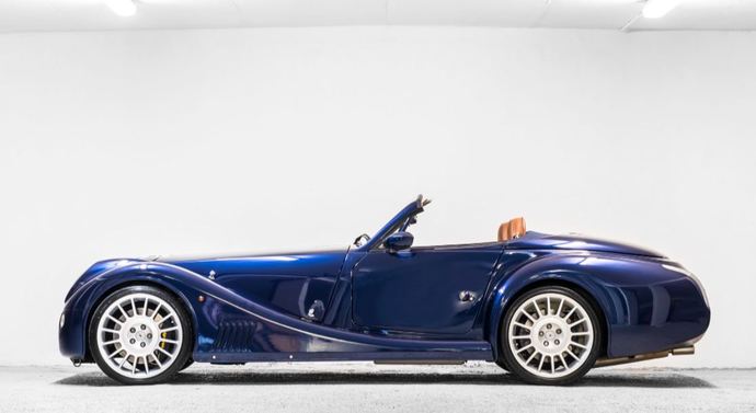 Which of these supercars photographed from the side is more appealing visually?