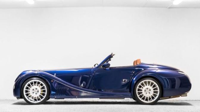 Which of these supercars photographed from the side is more appealing visually?