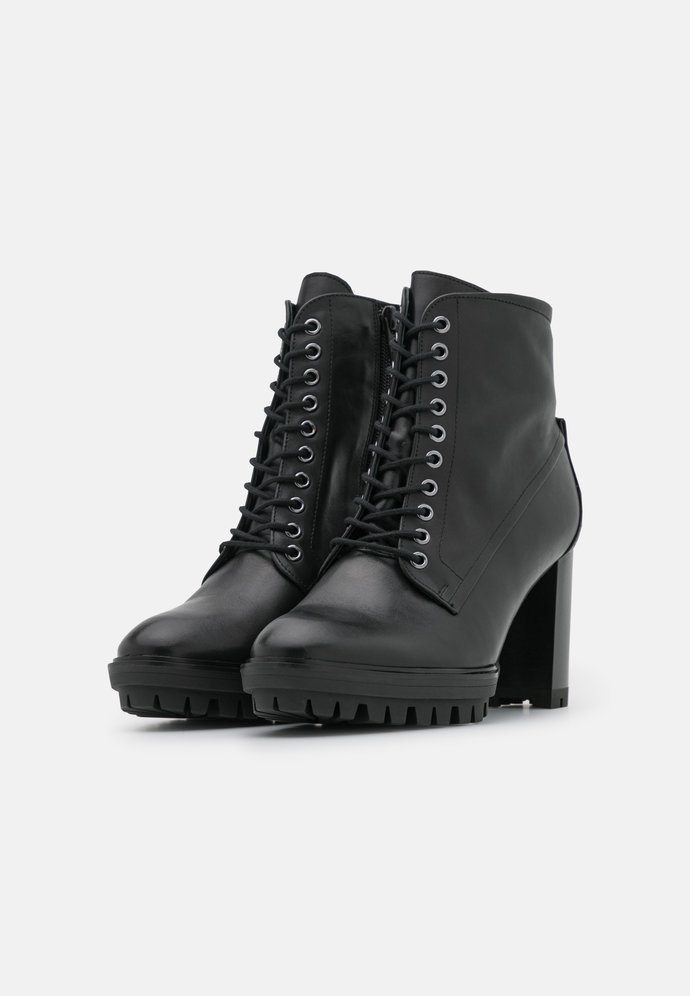 Which boots do you prefer - Elegant or Edgy?