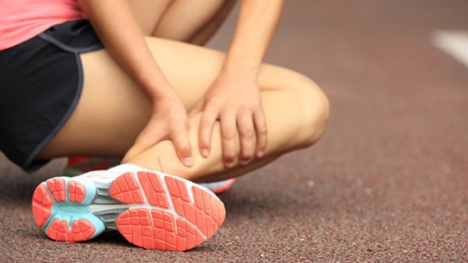 How do you deal with legs cramping or soreness after a workout?