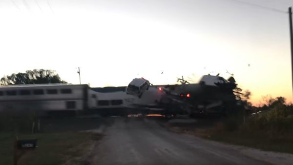 Oct. 16th 2021: Semi vehicle transport carrying cars is hit by train. None fatal