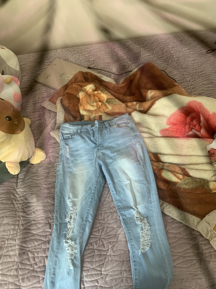 Which shirt should I wear with these jeans?