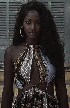 Can a woman be attractive if she has dark skin?