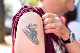 Girls, does a guy having tattoos make him more attractive, less attractive, or neutral/it doesnt matter?