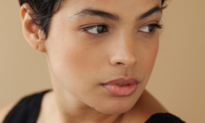 Guys, what do you find more attractive on a girl--tan skin or pale skin?