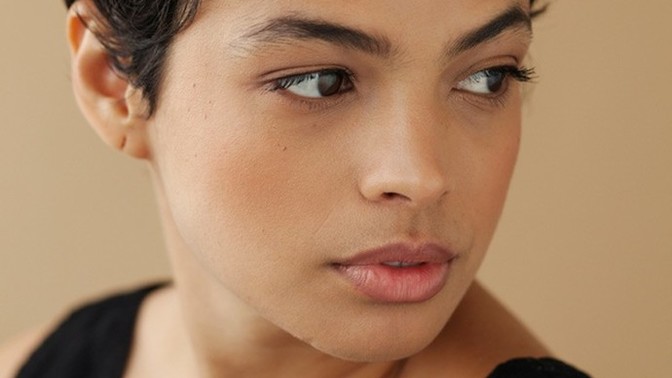 Guys, what do you find more attractive on a girl--tan skin or pale skin?