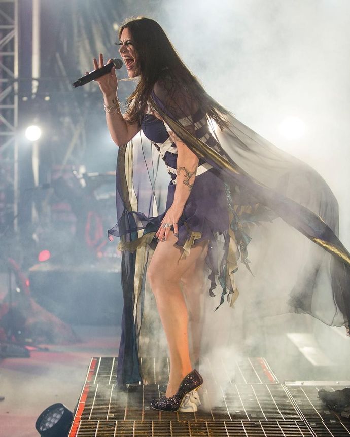 Floor Jansen, 6' 0" and in 6" heels