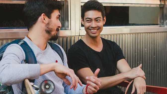 Why do some men feel uncomfortable with calling other men handsome?