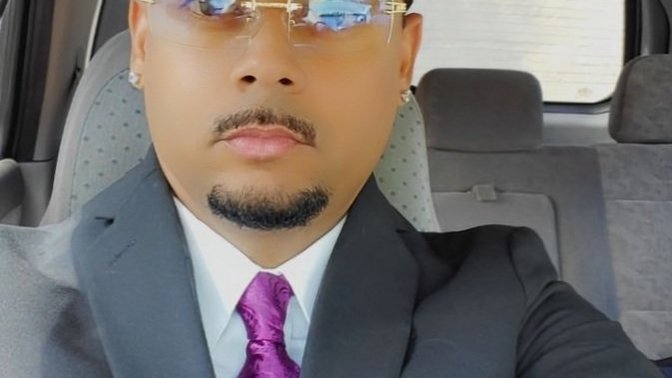 Do I look suspicious or into criminal activity wearing a suit and tie. Does my face look like a criminal such as a mugger or something suspicious?