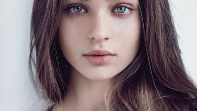 What does a boy notice when he first looks at a girl?