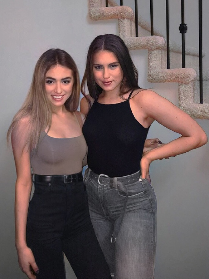 Was this an acceptable outfit to wear to a party (Im on the left)? My boyfriend told me my pants looked funny?