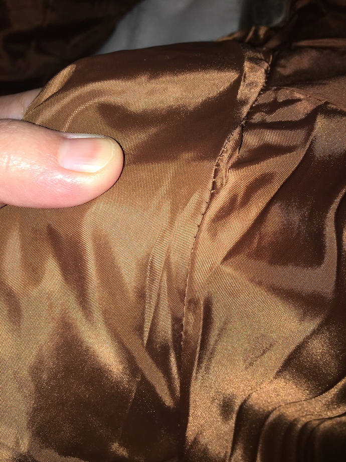Should I exchange or get a refund for this damaged jacket?