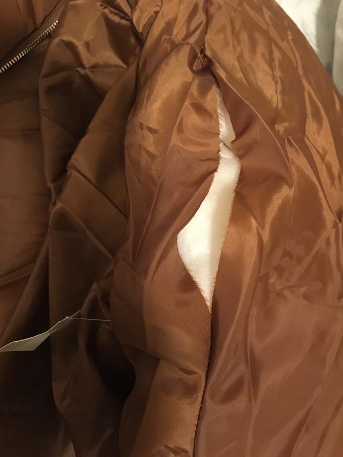 Should I exchange or get a refund for this damaged jacket?