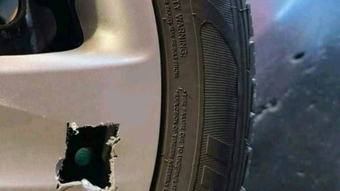 Is there a tool for cutting holes in hub caps?