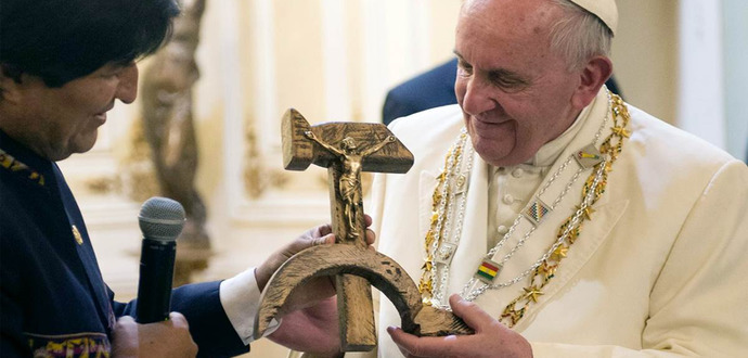 "Pope" Francis holds a Hammer and Sickle cross with Jesus on it.