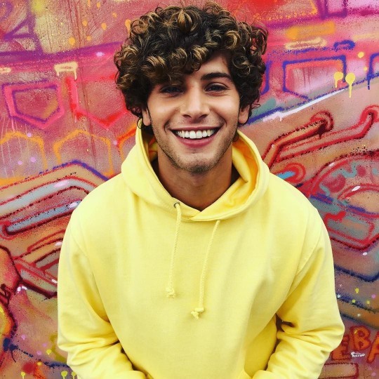 Is curly hair on a man attractive?