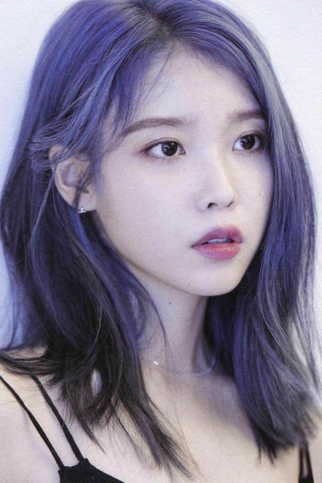 When you see an adult woman who has green, blue, or pink hair, does the hair color suggest anything about her personality?