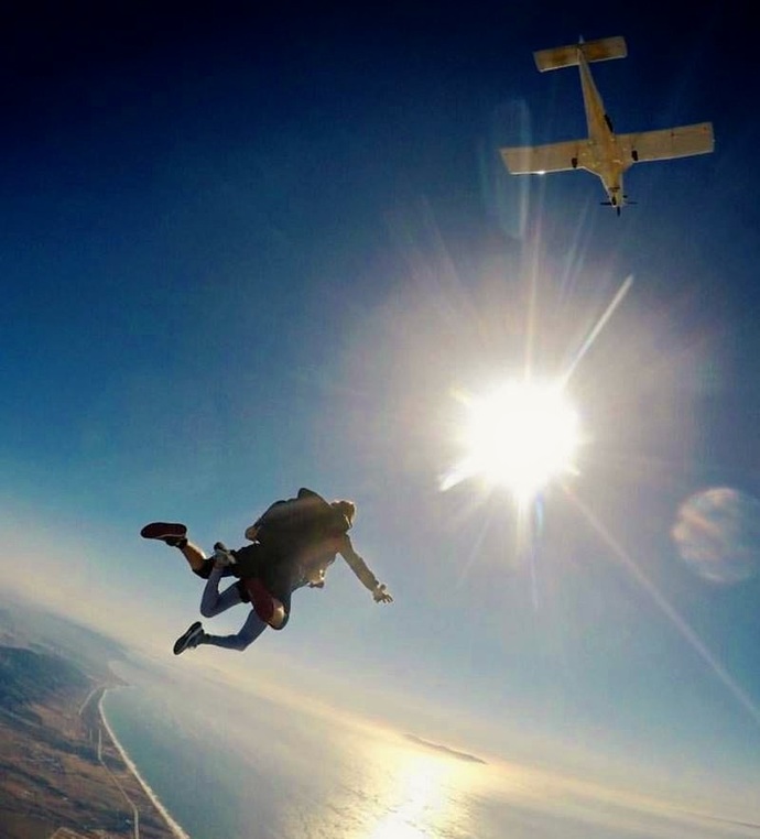 Me: Tandem dive with my instructor over the California coast 