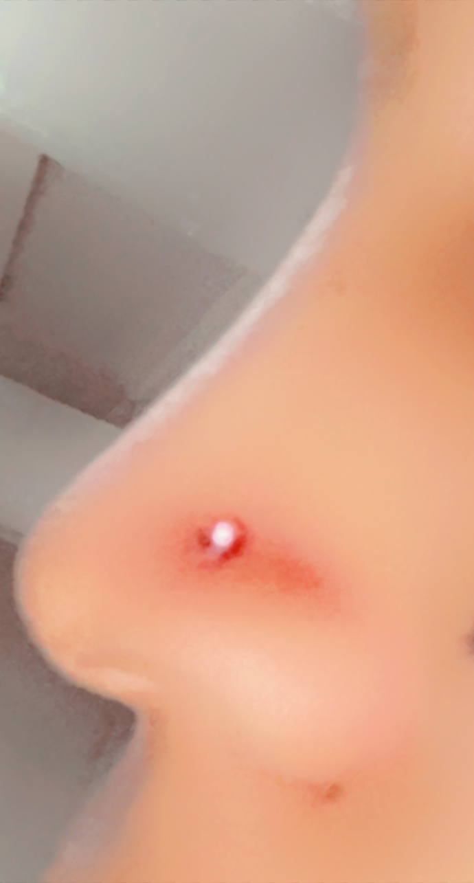 Is my nose piercing too high?