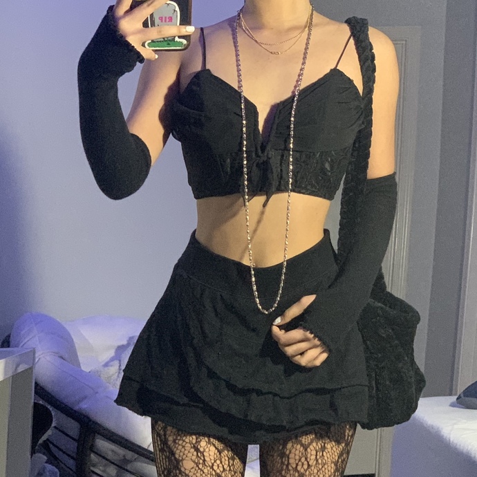 Which skirt looks better with my outfit: black or white?